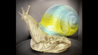 Enchanting Bronze River Snail Lamp