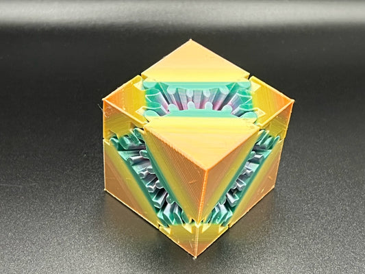 Engaging Orange Mint Gear Cube Fidget Toy